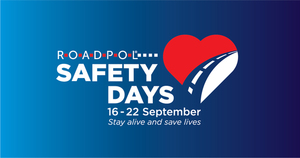 Na zdjęciu na granatowym te biało czerwone serce i napis roadpol safety days 16-22 september stay alive and save lives.