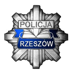 Na zdjeciu policyjna gwiazda z napisem Policja Rzeszów.