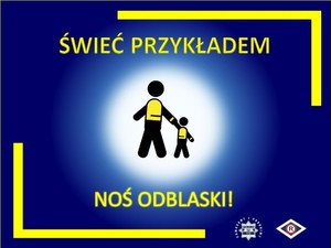 Na zdjęciu w granatowo żółtej tonacji dwa ludziki trzymające się za ręce i napis świeć przykładem-noś odblaski!